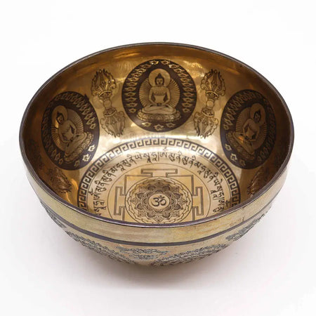 Golden brass singing bowl with buddha engravings om symbols and sanskrit script 21cm tibetan bowl om buddha
