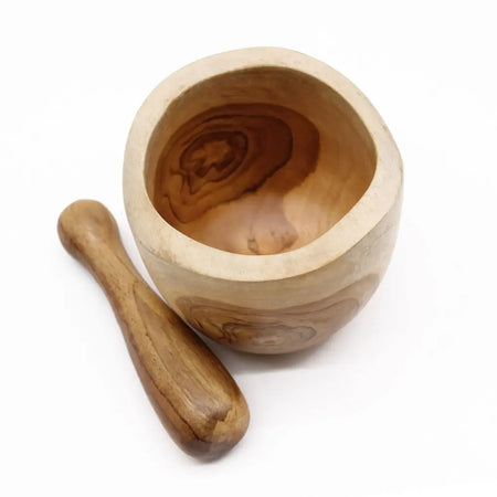 Large teak pestle and mortar set made of handcrafted olive wood with natural grain patterns and water resistant finish