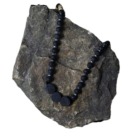 Essence of the volcano necklace with black natural lava stone beads and silver accents for essential oil use