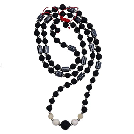 Essence of the volcano necklace with black and silver natural lava stone beads and a red cord tie for cultural connection