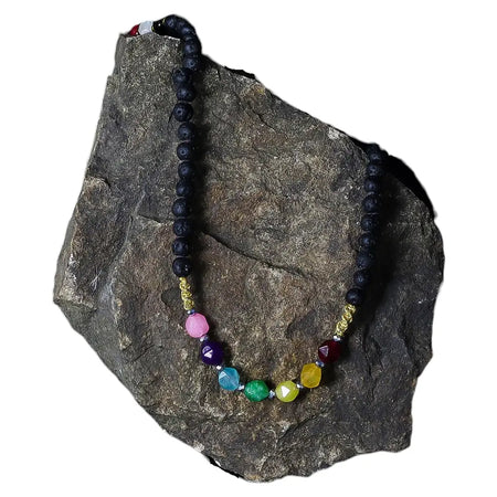 Essence of the Volcano lava stone necklace with dark volcanic beads and rainbow faceted gemstones for emotional healing