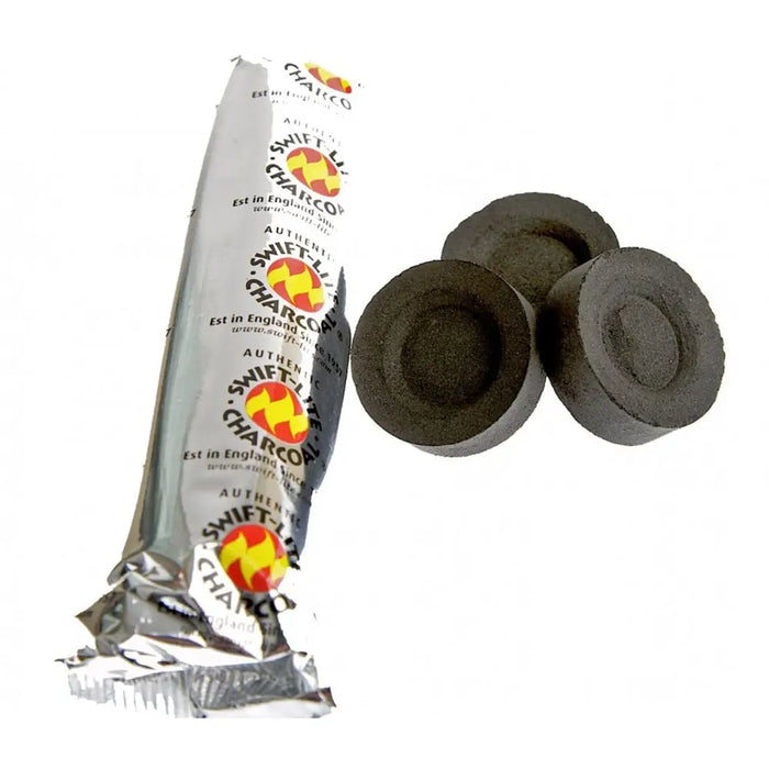 Black circular charcoal tablets made of compressed charcoal in a silver swift-lite foil wrapper box of 80 Excelsior charcoal tablets