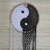Extra large bali dream catcher with black and white crocheted yin yang design wooden hoop macrame fringe and tassels to block bad dreams