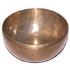 A polished bronze extra large handmade singing bowl with reflective interior and subtle tarnish marks g3b 185hz g3b