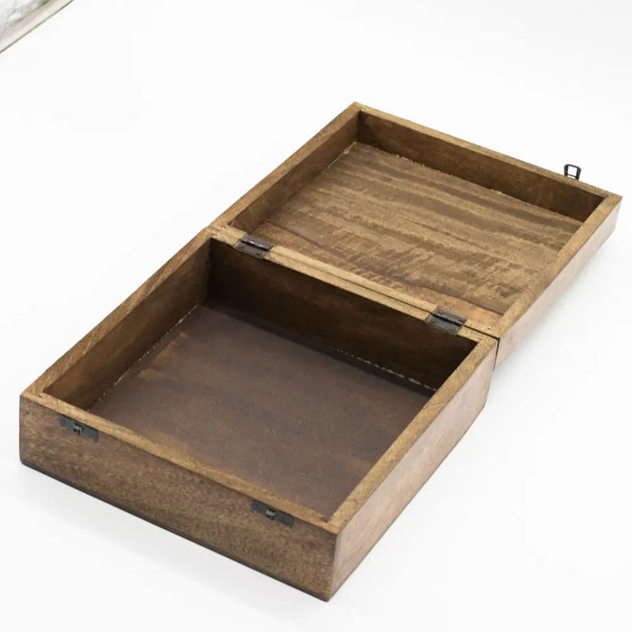 A rectangular extra large mango wood box with dark brown grain and black metal hinges called buddha bodi tree