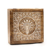 A whitewash square mango wood box with carved mandala design featuring flower of life and moon phases
