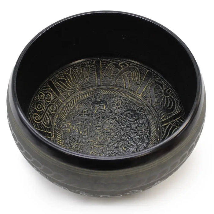 Black tibetan extra loud singing bowl with intricate engraved five buddha figure and floral patterns