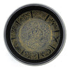 Black circular singing bowl tray with intricate gold embossed buddhist meditative figure and ornate patterns