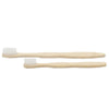 Two medium soft bamboo toothbrushes with white bristles in a family pack, one slightly longer than the other