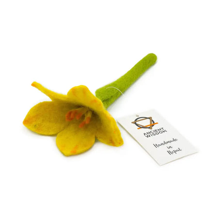 A handcrafted yellow felt daffodil with green stem and orange stamens made using ancient wisdom in nepal