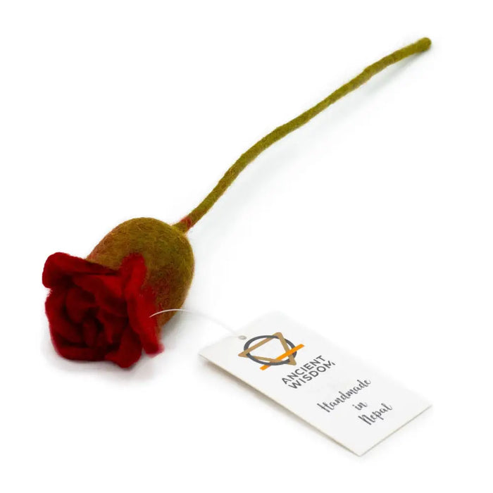 A handcrafted felt flower featuring a vibrant red rose bloom with an olive green wool stem made from wool