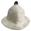 A soft off-white felted sauna bowl hat with a wide brim and brown leather loop on top