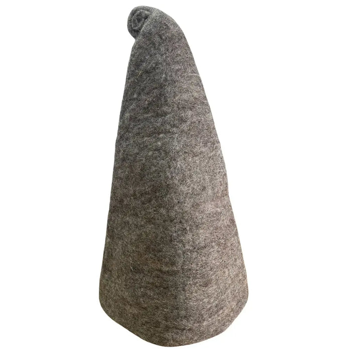 A textured gray felted wizard sauna hat with a pointed top and rounded base for sauna use in natural brown tones