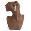 Silver festive fir leaf earrings with textured surface and simple hook inspired by real leaves