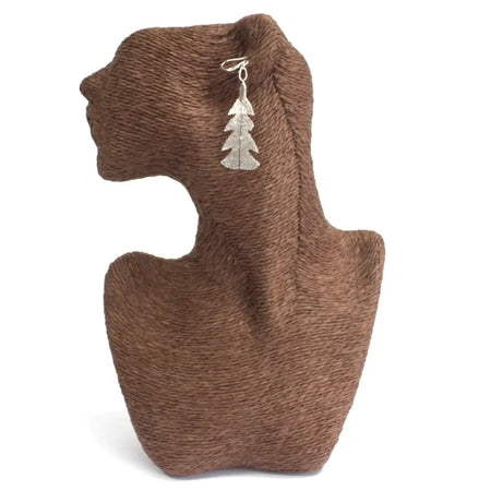 Silver festive fir leaf earrings with textured surface and simple hook inspired by real leaves