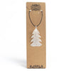 Silver glittery festive fir leaf necklace pendant on black cord featuring real leaves design