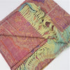 A fine woven pashmina shawl in pink purple and orange with paisley pattern and green blue fringes
