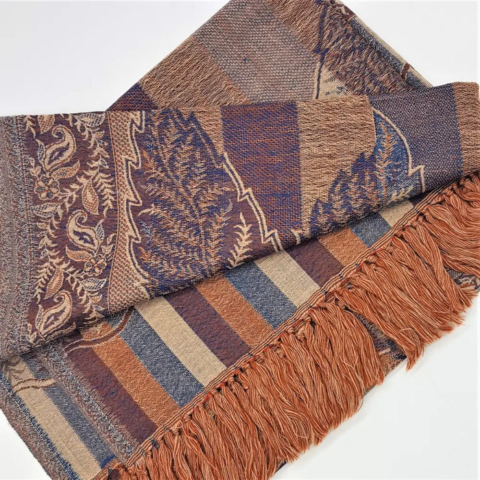 A fine woven pashmina scarf with patchwork design in earthy browns navy blue beige and rust fringe details