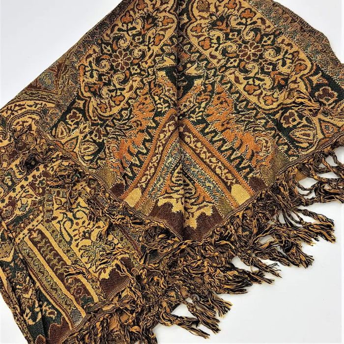 A richly patterned earth toned pashmina scarf with floral and geometric designs in brown gold and dark green with fringe