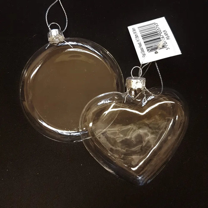 Flat glass hanging ornaments in clear glass with silver caps in circular and heart-shaped designs