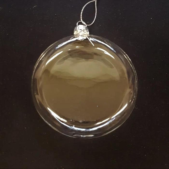 Clear flat glass christmas ornament with silver metallic cap and hanging loop, one of two design options