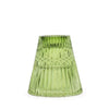 A translucent green glass flip dinner candle holder with a fluted design for tealight candles in garden jade color