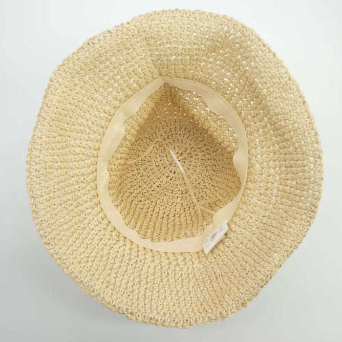 Beige floppy straw sun hat with woven material and soft flexible inner band for comfortable sun protection