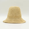 Beige woven straw sun hat with wide brim and textured crochet pattern natural floppy straw sun hat
