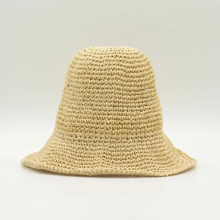 Beige woven straw sun hat with wide brim and textured crochet pattern natural floppy straw sun hat