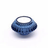 A royal blue glass flower flip dinner tealight holder with textured ridges and smooth inner rim for candles