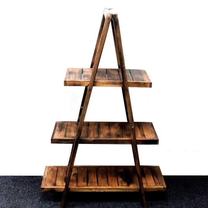 Dark brown folding albesia wood a-frame ladder shelf with three slatted tiers for storage and display