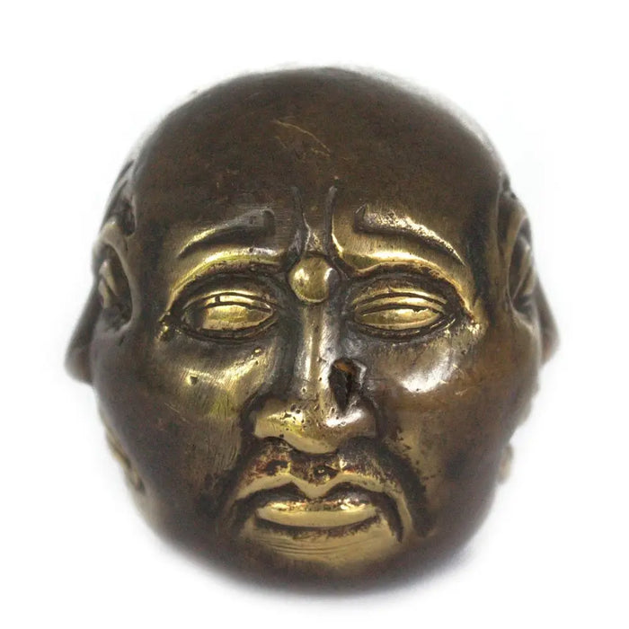 Antique bronze four face buddha head charm 6cm with detailed facial features and patina finish