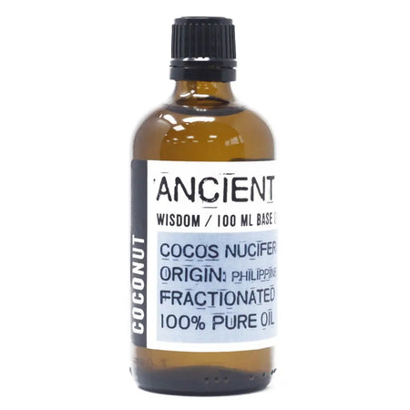 A sleek amber glass bottle of fractionated coconut oil with a black cap labeled ancient wisdom 100ml fractionated coconut