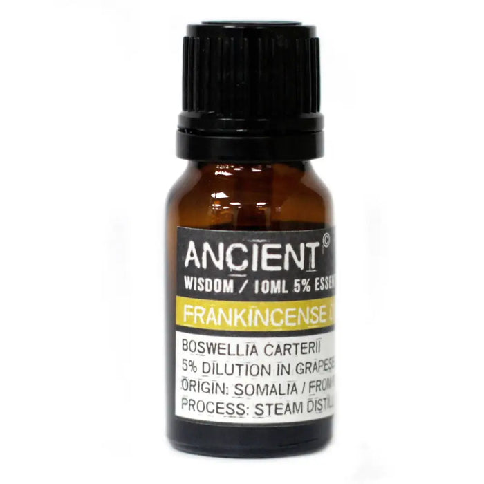 A small amber glass bottle with black cap containing 10ml frankincense essential oil labeled ancient wisdom
