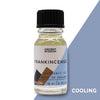A clear glass bottle with black cap contains pale yellow frankincense fragrance oil labeled ancient wisdom cooling with allergen declarations