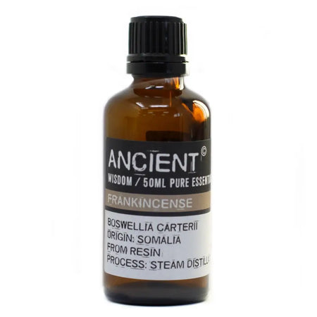 A 50ml amber glass bottle of frankincense essential oil with black cap and somalia origin label showing boswellia carterii allergen declarations