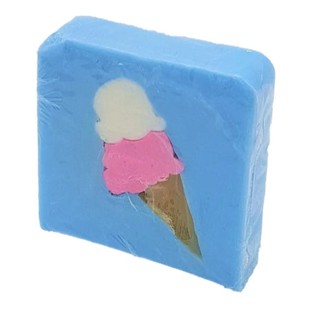 Blue handmade soap slice with a pink and white ice cream cone design and gold waffle cone base