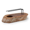 Rustic whitewash gamal wood palo santo heater with circular hole and black metal wire rack on a wooden cutting board