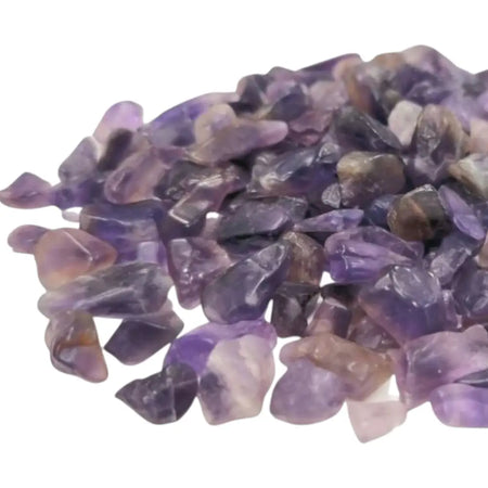 A pile of smooth translucent amethyst gemstone chips in shades of purple and lavender weighing 1kg
