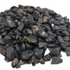 Black tourmaline gemstone chips with smooth black river rock pebbles and subtle brownish undertones in 1kg pack