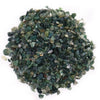 A pile of green and dark moss agate gemstone chips with mixed translucent and semi-translucent textures weighing 1kg