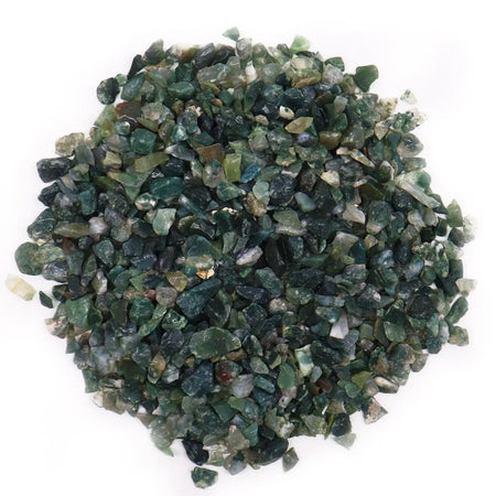 A pile of green and dark moss agate gemstone chips with mixed translucent and semi-translucent textures weighing 1kg
