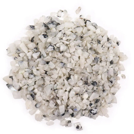 A pile of white and black speckled quartz gemstone chips for rainbow moon collection weighing 1kg