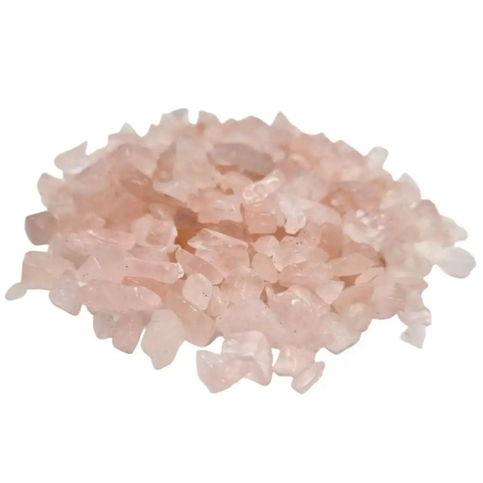 A pile of translucent pink rose quartz gemstone chips with irregular jagged edges weighing 1kg