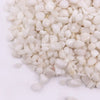 White quartz gemstone chips showing smooth rounded glossy white pebbles in a 1kg pack