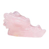 A gemstone dragons head carved from translucent pink rose quartz shaped like a seashell with smooth glossy surfaces