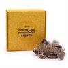 A string of citrine enchantment lights with rough-cut translucent amber and dark brown gemstone beads