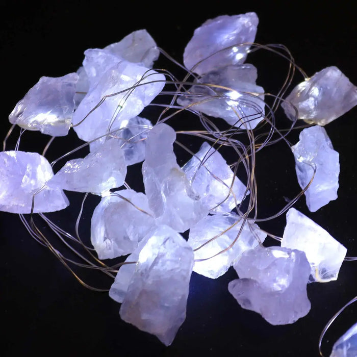 String of enchantment lights with translucent lavender rock quartz crystal pieces for soft decorative lighting