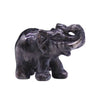 A polished dark gray larvikite labradorite lucky elephant figurine with subtle veining and a glossy finish