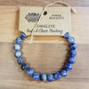 A blue sodalite gemstone bead bracelet with natural stone pattern shown on its branded tag for mood support